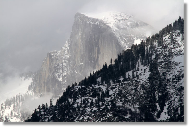 Half Dome, storm clouds, and mist