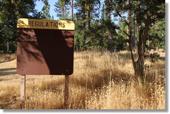 Regulations board at the Pines Campground bewteen Groveland and Buck Meadows, California