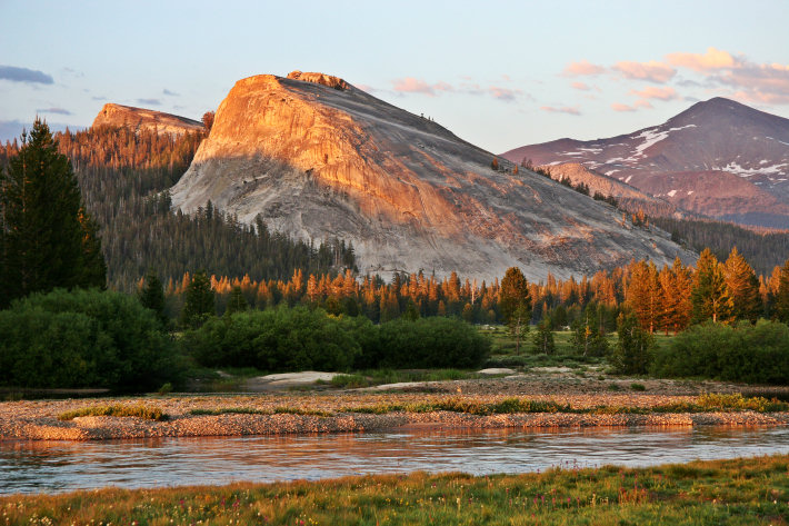 Lembert Dome at sunset with the Tuolumne River and Tuolumne Meadows in the foreground