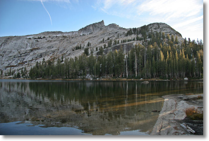 Tresidder Peak rises behind the south shore of Lower Cathedral Lake